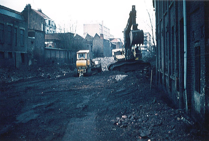 Travaux de comblement de la Lys derrière la brasserie Breuvart