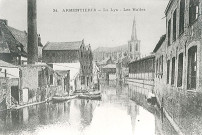 Vue sur la Lys, les halles et l'église Saint-Vaast