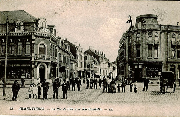 Entrée de la rue de Lille, épicerie Salomé et pharmacie universelle Dufour