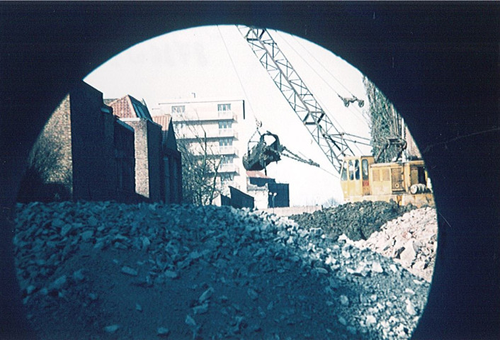 Travaux de comblement de la Lys derrière la brasserie Breuvart